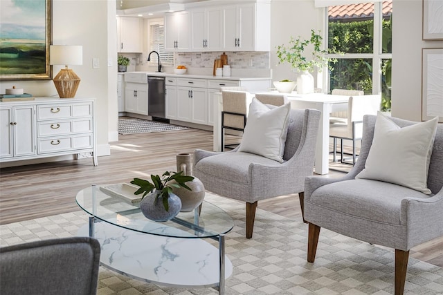 956 Harbor Town Dr, Venice, FL 34292 - living room featuring light wood-style floors and baseboards