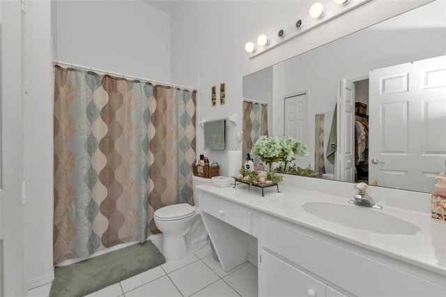 bathroom featuring vanity, toilet, tile patterned floors, and a shower with shower curtain