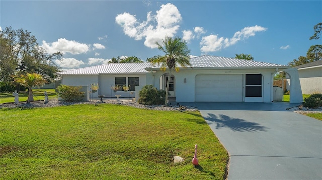 ranch-style house with a garage and a front yard