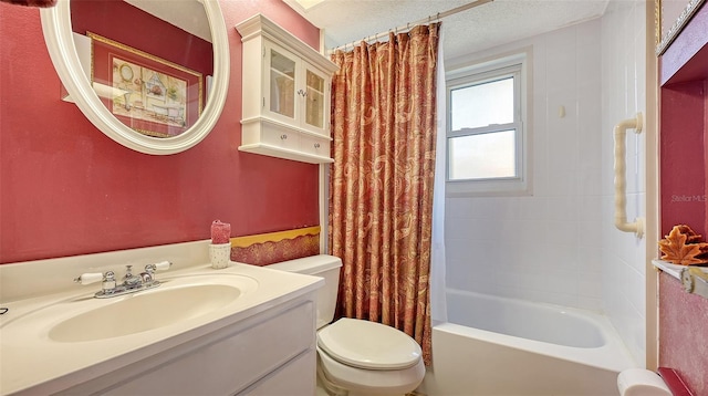 full bathroom featuring toilet, vanity, a textured ceiling, and shower / bathtub combination with curtain