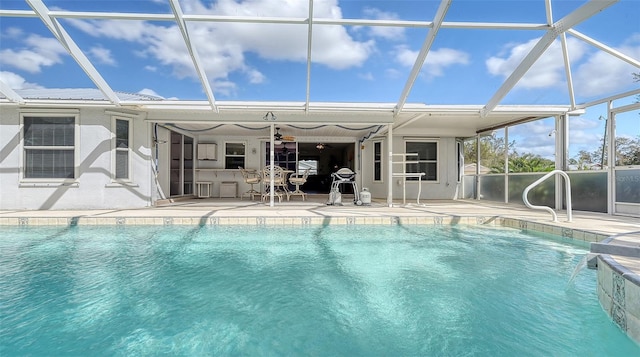 view of pool with a lanai and a patio area