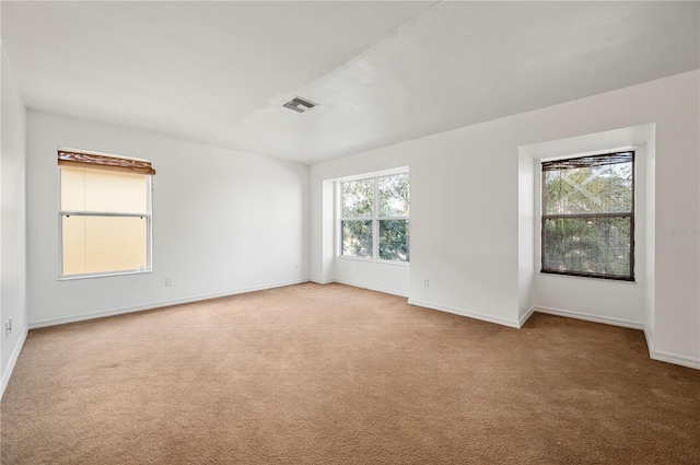 unfurnished room with carpet