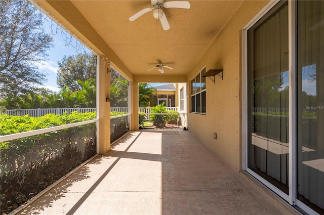 view of patio featuring ceiling fan