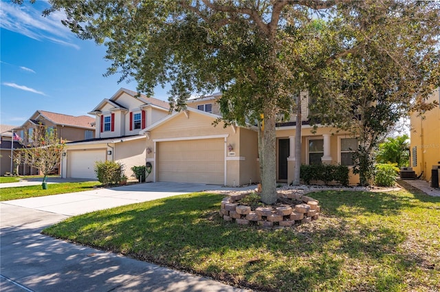 view of front of property featuring a garage and a front yard