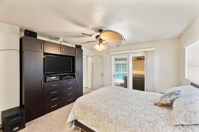 bedroom with carpet, a textured ceiling, access to outside, and ceiling fan