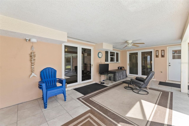 view of patio featuring ceiling fan