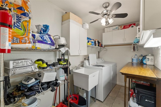 laundry area featuring washer and clothes dryer, ceiling fan, cabinets, and light tile patterned floors