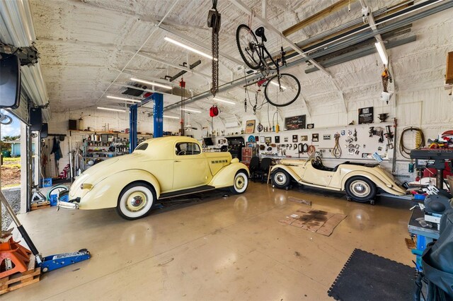 543 Lincoln Ave NW, Port Charlotte, FL 33952 - garage with a workshop area