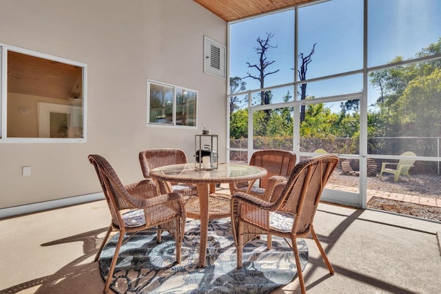 sunroom / solarium with wooden ceiling