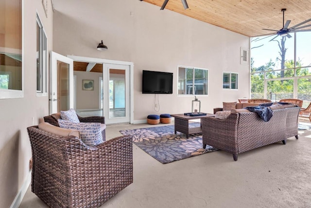 view of patio with outdoor lounge area and ceiling fan