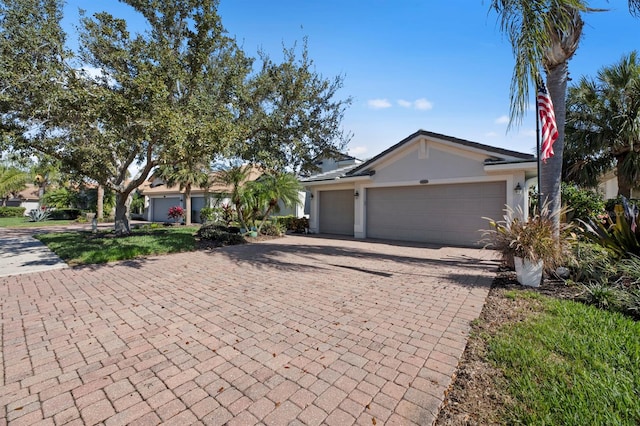 ranch-style home with a garage