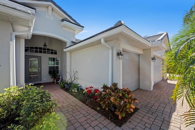 property entrance with a garage