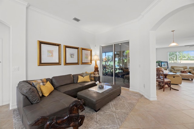 tiled living room featuring crown molding