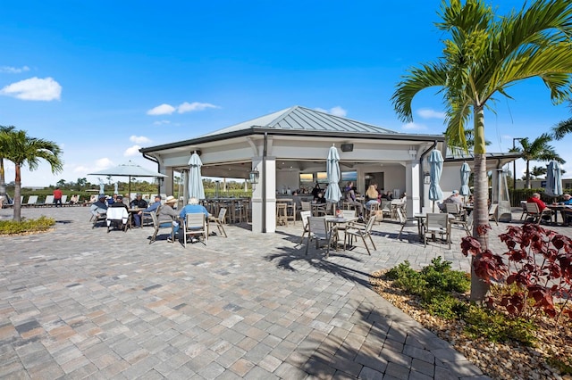 view of home's community featuring a patio area