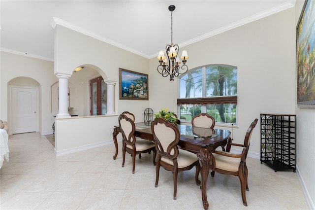 tiled dining space with ornate columns, crown molding, and a notable chandelier