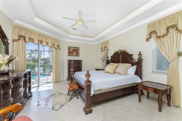 tiled bedroom with access to outside, a tray ceiling, ceiling fan, and crown molding