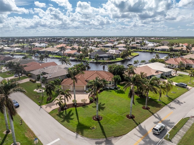 drone / aerial view featuring a water view