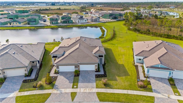 birds eye view of property featuring a water view