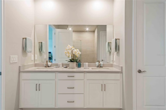 bathroom with vanity and walk in shower