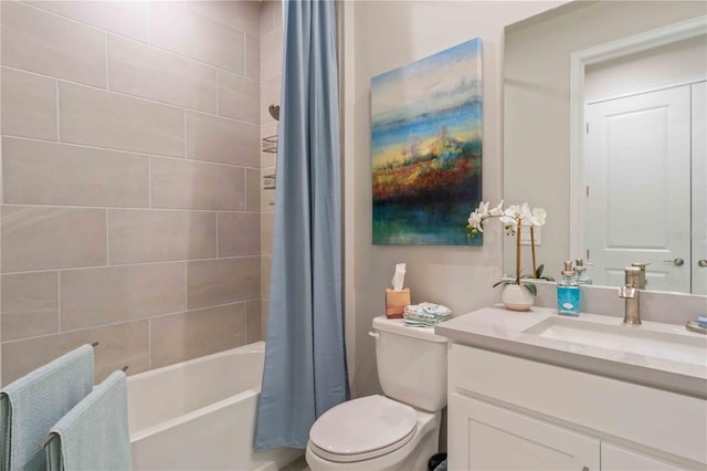 full bathroom featuring vanity, toilet, and shower / bath combo with shower curtain