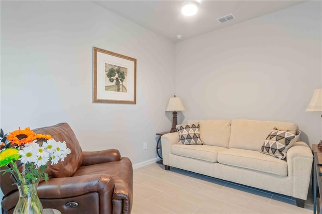 living room with light tile patterned floors