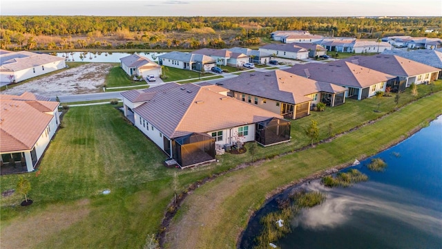 drone / aerial view featuring a water view