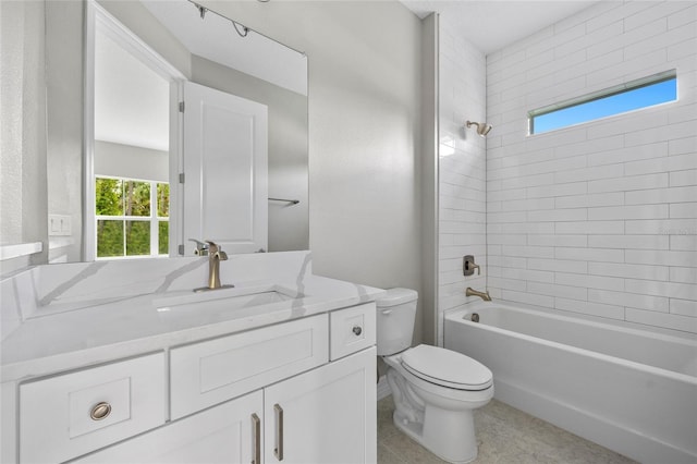 2404 Hanford Ln, North Port, FL 34288 - full bath with vanity, shower / bathing tub combination, toilet, and a wealth of natural light