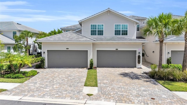 view of front of property with a garage