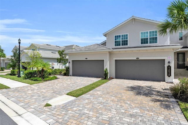 view of front of property featuring a garage