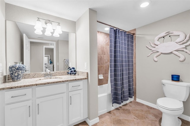 full bathroom with vanity, shower / bath combo with shower curtain, toilet, and tile patterned flooring