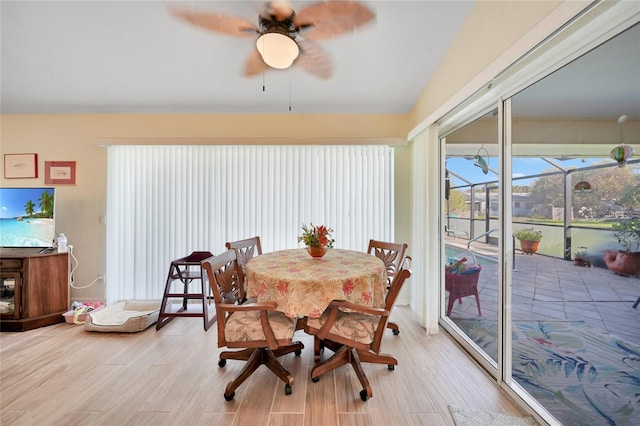 dining room featuring ceiling fan and light wood-type flooring