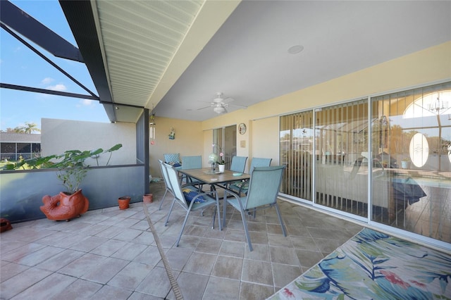 view of patio / terrace with ceiling fan and a lanai