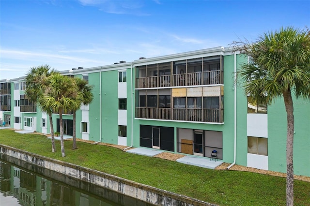 view of building exterior featuring a water view