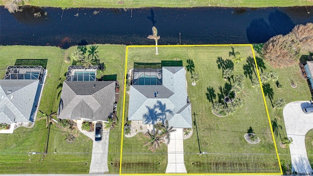 bird's eye view with a water view