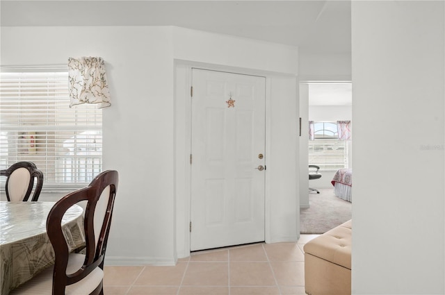 entrance foyer with light tile patterned flooring