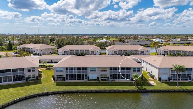 bird's eye view with a water view