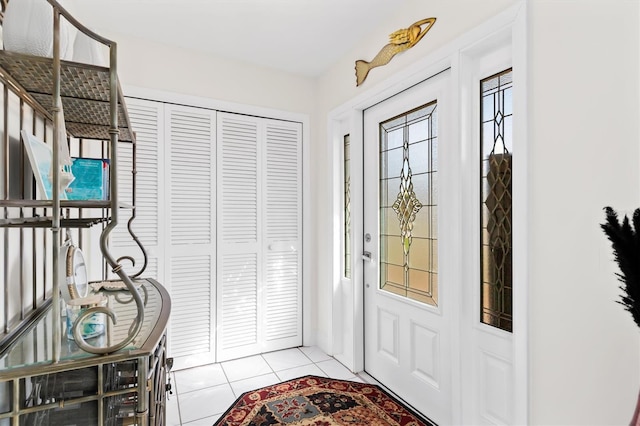 entryway featuring light tile patterned floors