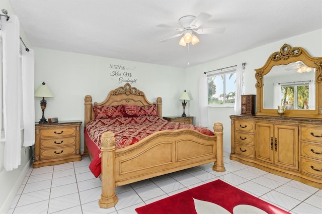 bedroom featuring a ceiling fan and light tile patterned flooring