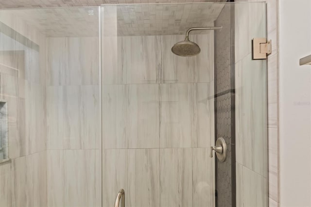 details with a tile shower