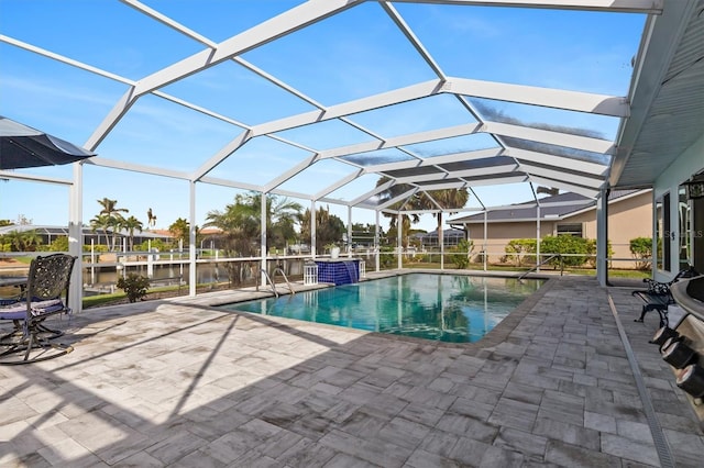 pool featuring a lanai and a patio