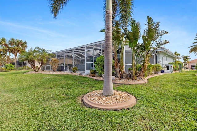 view of yard featuring a lanai