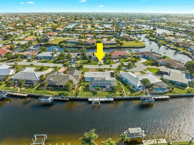 aerial view with a residential view and a water view