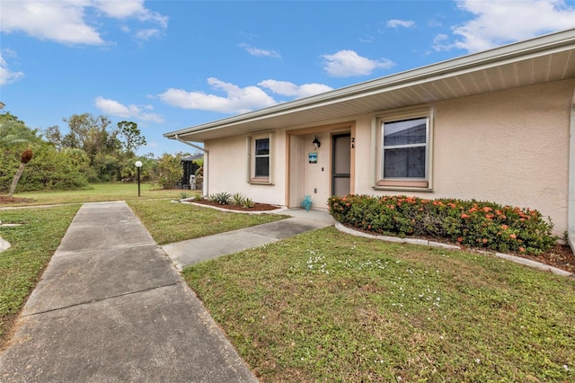 view of front of property with a front lawn