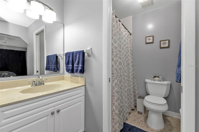 bathroom with toilet, vanity, a shower with shower curtain, and tile patterned flooring