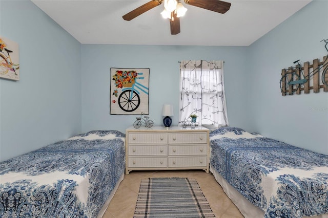 bedroom with light tile patterned flooring and ceiling fan