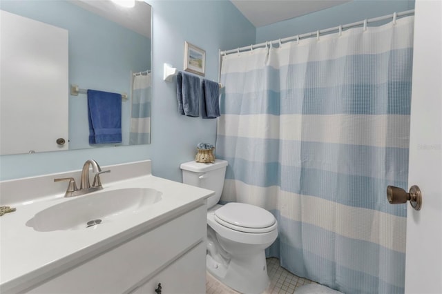 bathroom with vanity, a shower with curtain, tile patterned floors, and toilet