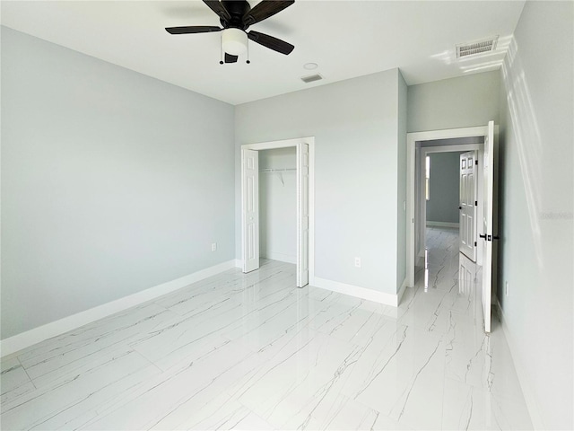 unfurnished bedroom featuring a closet and ceiling fan