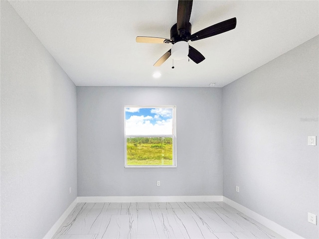 unfurnished room with ceiling fan