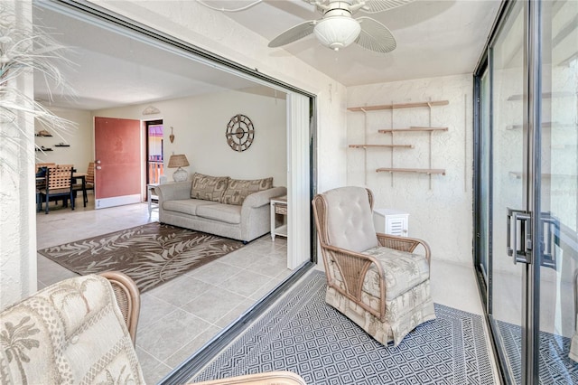 living room with ceiling fan