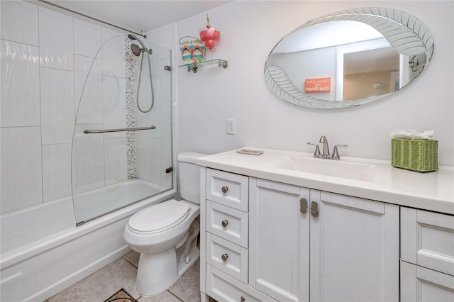 full bathroom with toilet, enclosed tub / shower combo, vanity, and tile patterned floors